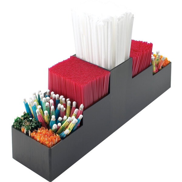 A black Cal-Mil bar organizer with sections for straws and sticks.