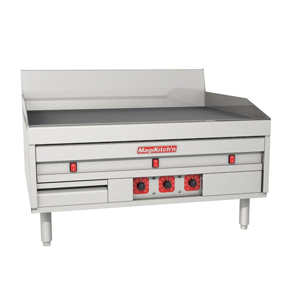 A white rectangular MagiKitch'n countertop griddle with red knobs.