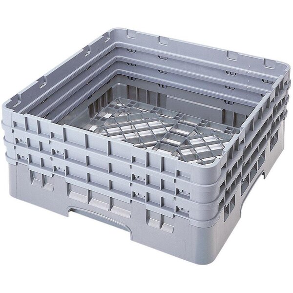 A grey plastic Cambro dish rack with four compartments and closed sides.