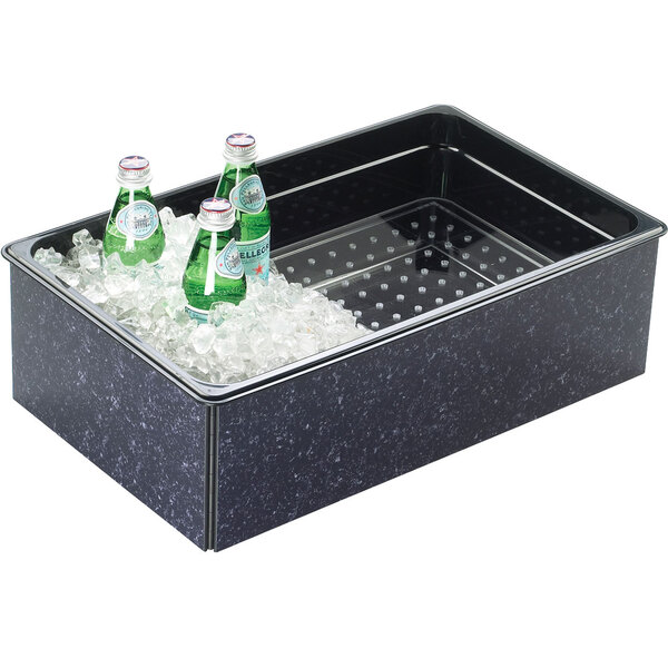 A black rectangular Cal-Mil ice housing with ice and bottles of soda inside.