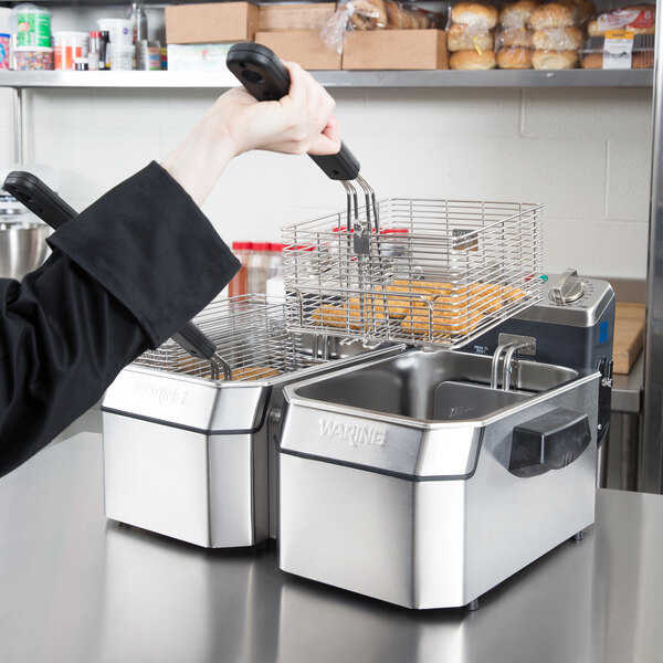 Waring WDF1000D Double 10 lb. Commercial Countertop Deep Fryer Set 120V