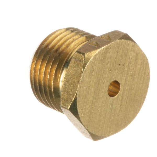 A close-up of a brass nut with a brass threaded nut on a white background.