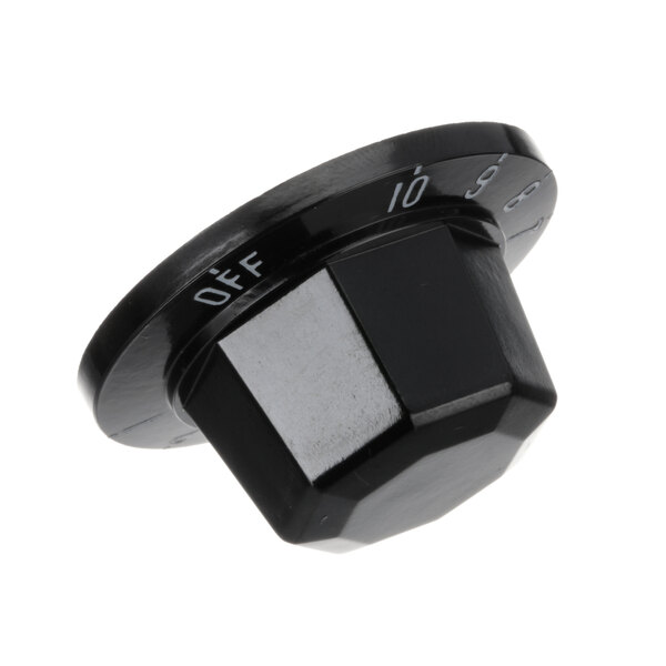 A black plastic Crown Steam knob with white text.