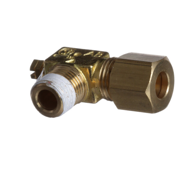 A close-up of a brass Montague pilot valve with a white background.