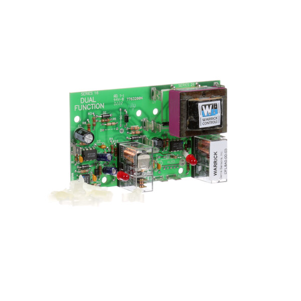 A close-up of a green Market Forge water controller circuit board with many small components and two wires.