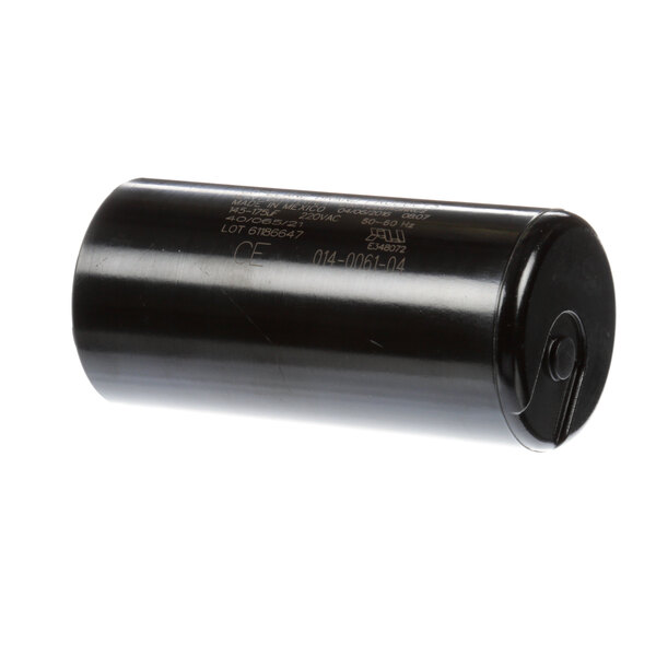 A black cylindrical Master-Bilt start capacitor with a capacitor cap.