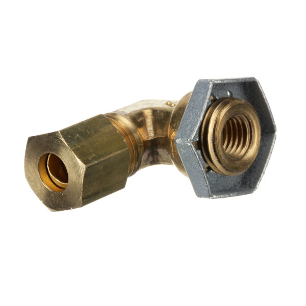 A close-up of a brass threaded Duke gas burner elbow with a nut.