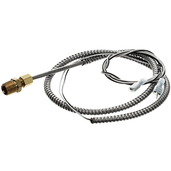 A metal cable with a brass connector.