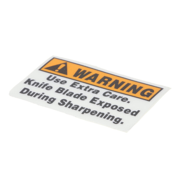 A black and yellow sticker warning to use extra care when sharpening the Globe 967-2 knife blade.