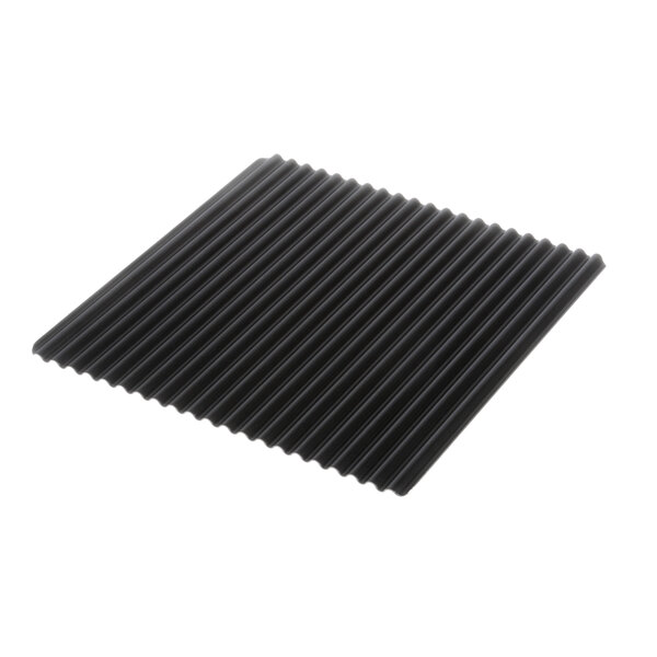 A black Teflon plate with corrugated metal and black stripes.