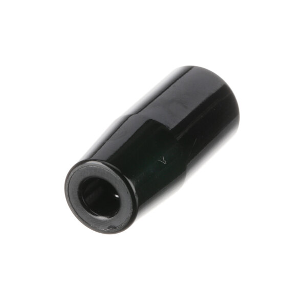 A black plastic tube with a hole.