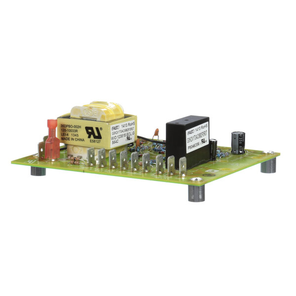 A green circuit board with a black and yellow box on it.