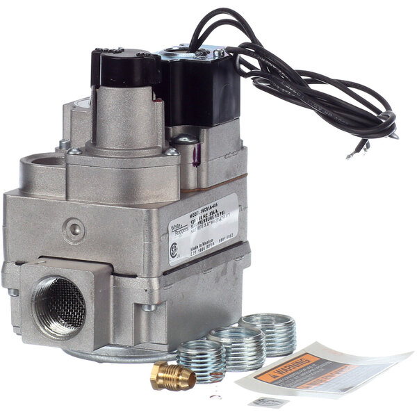 A Stero gas valve with a wire and metal parts.