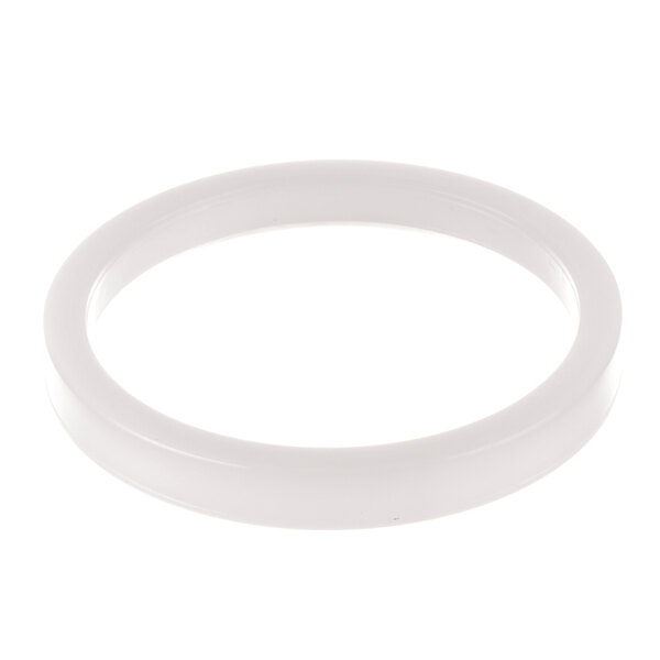 A white plastic circle with a hole in the center on a white background.