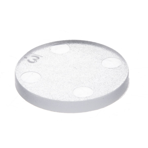 A white round plate with dots.