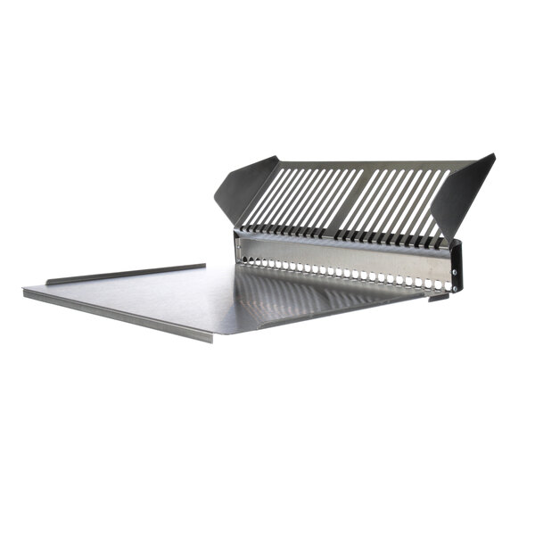 An APW Wyott stainless steel feeder tray with holes on top of a metal grill.