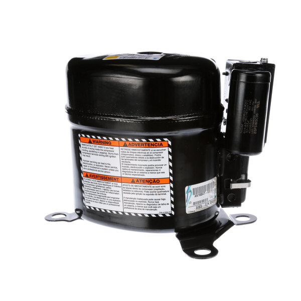 A Randell refrigeration compressor with a black housing and orange label.