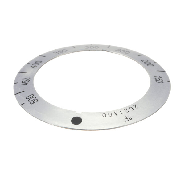 A circular metal US Range dial insert with numbers on it.