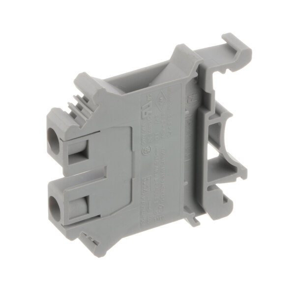 A grey plastic TurboChef terminal block with two holes on the side.