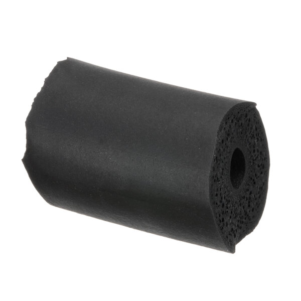 A black roll of foam insulation with a hole in it.