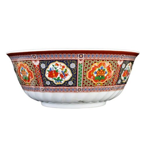 A close-up of a Thunder Group Peacock Melamine Bowl with a red and orange design.