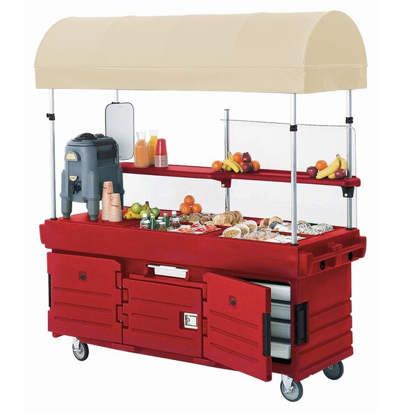 A red Cambro CamKiosk vending cart with canopy and pan wells.
