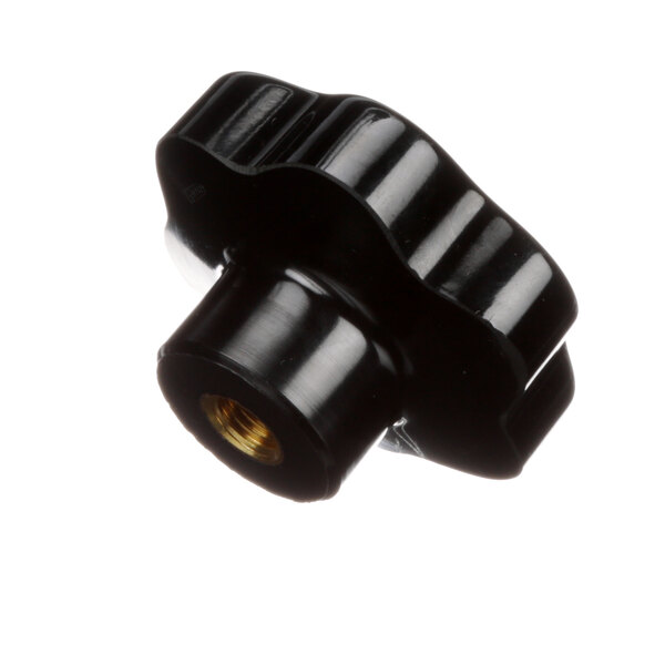 A black plastic knob with a gold nut on a Univex carriage arm.