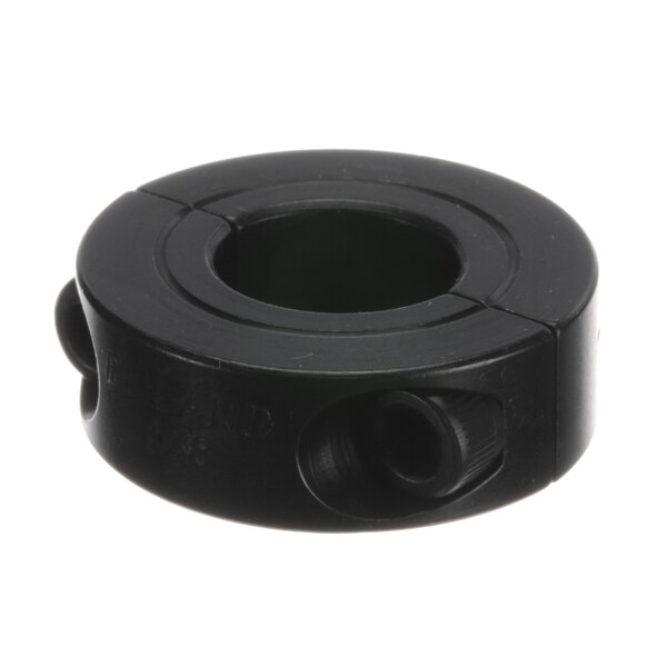 A black round object with two holes.