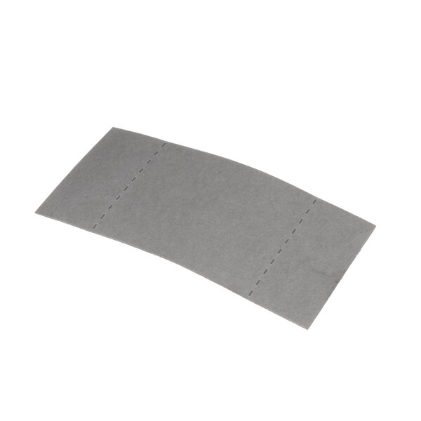 A gray piece of paper with a curved edge with a hole in it.