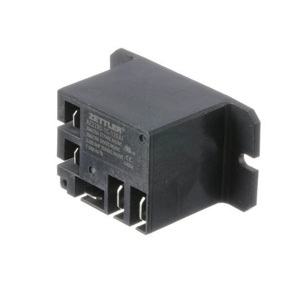 A close-up of a black Traulsen relay with white text.