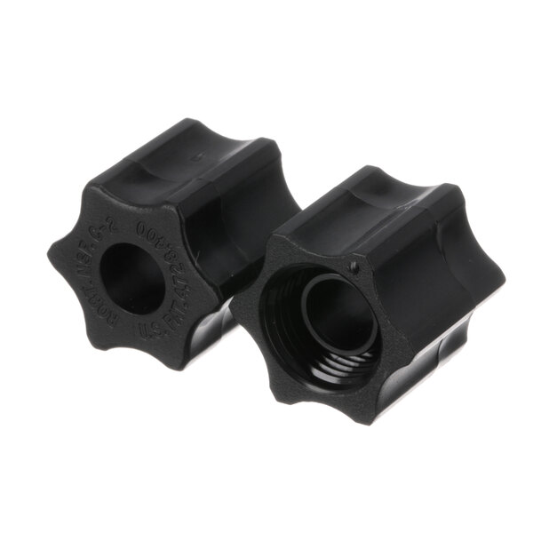 A pair of black plastic Manitowoc Ice compression nuts.