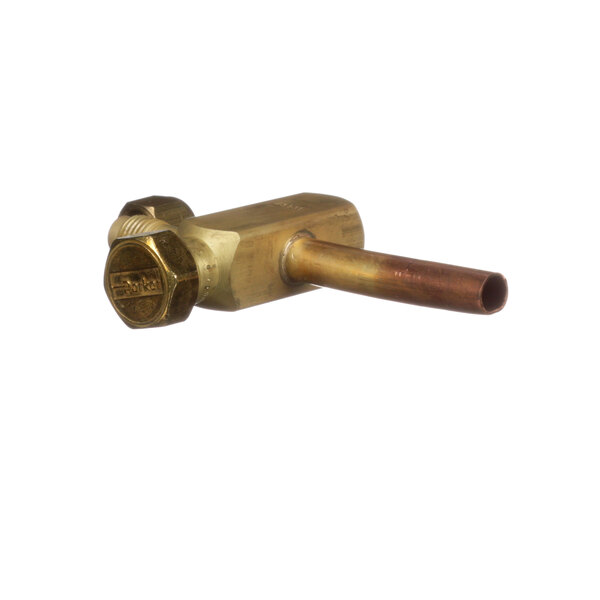 A brass Scotsman valve with a nut on it.