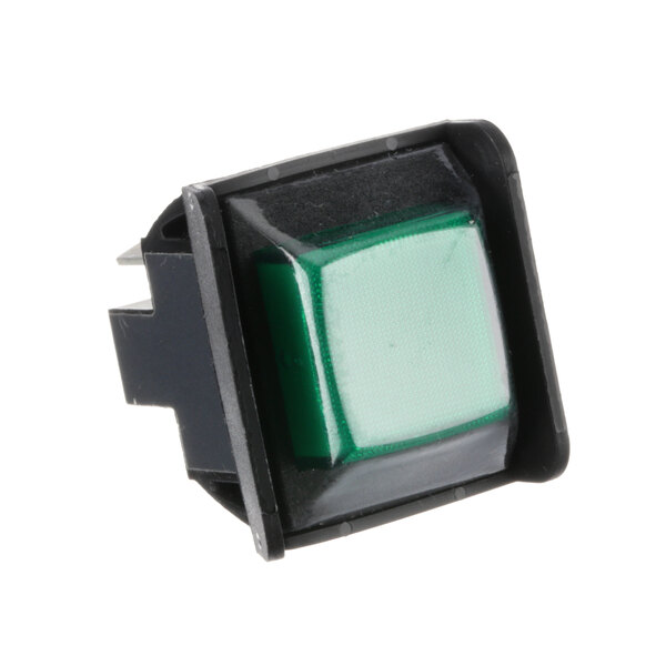 A close-up of a green square button with a black plastic holder.
