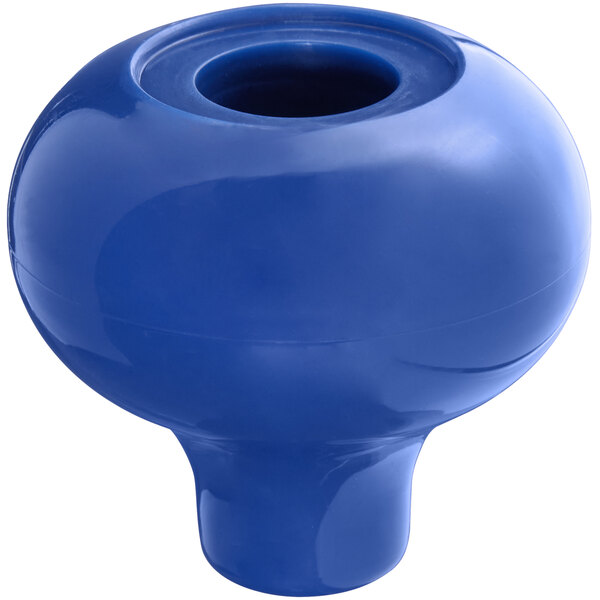 A blue round knob with a hole in it.