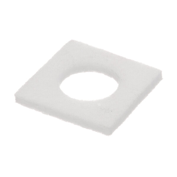 A white square gasket with a hole in it.