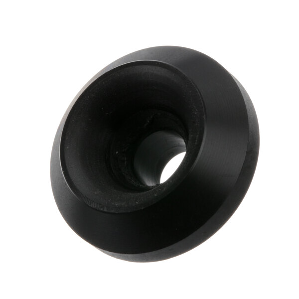 A black round lock bushing with a hole in it.