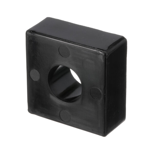 A black square Henny Penny door stop block with a hole.