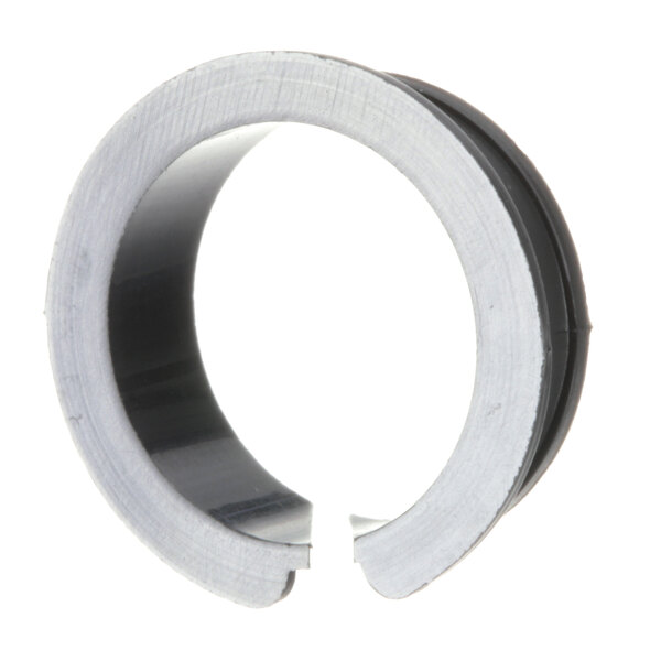 A close-up of a metal flange bearing clip.