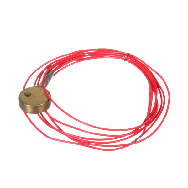 A close up of a ProLuxe solid state sensor with a red wire and gold circle.
