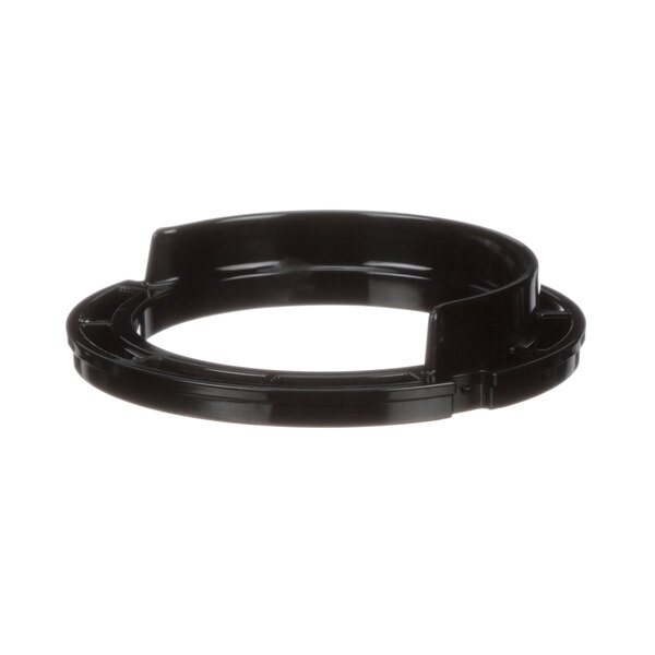 A black plastic Multiplex cup alignment insert ring with a hole in it.