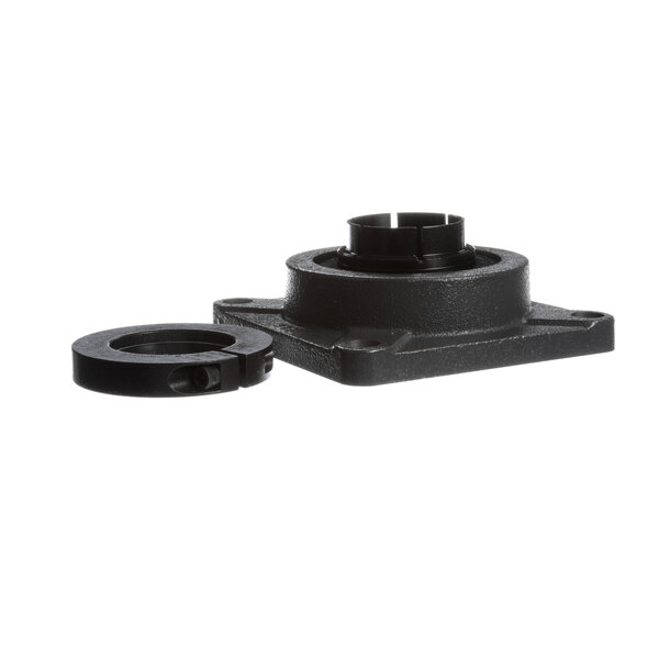 A black metal bearing flange with holes in it.