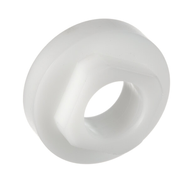 A white plastic bushing with a hole in the middle.