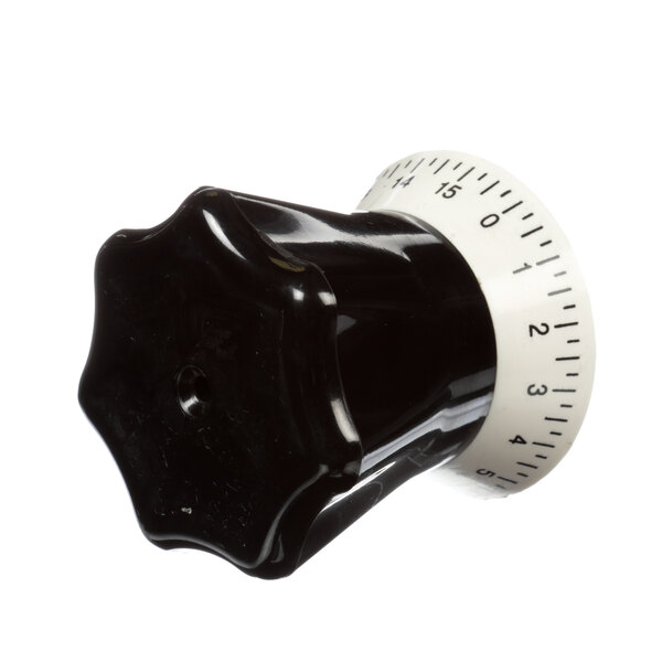 A black and white plastic Univex knob with a white dial.