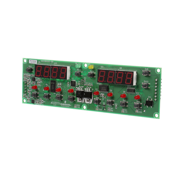 A green circuit board with red and black buttons.