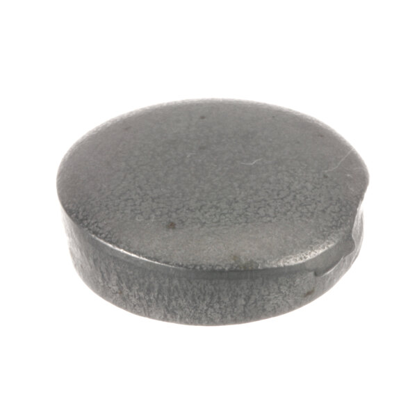 A close-up of a round grey ProLuxe tubing pad