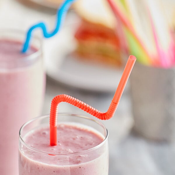 Two glasses of smoothie with Choice jumbo neon wrapped crazy straws in them.