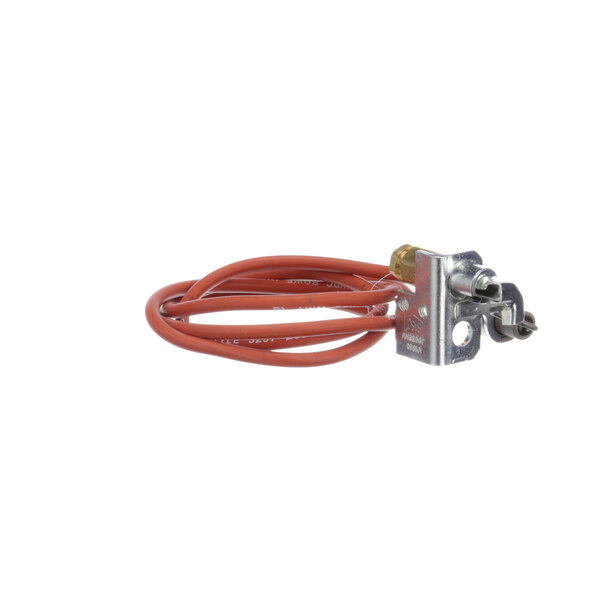 A Groen pilot burner with a red cable and metal connector.