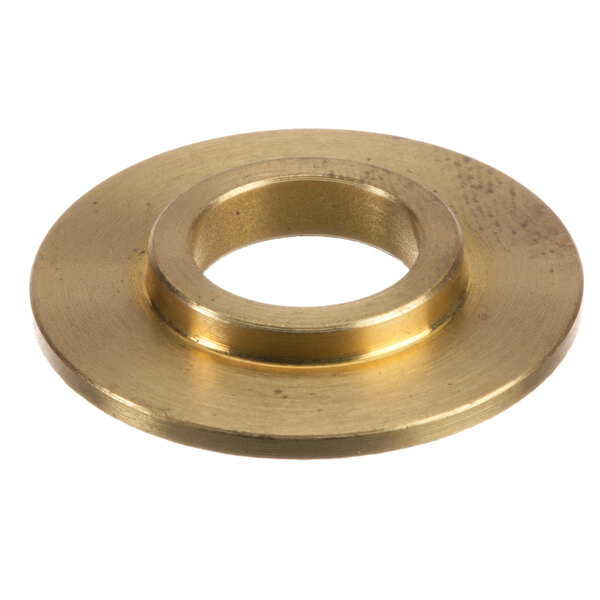 A brass plated steel Univex spacer with a hole in the center.