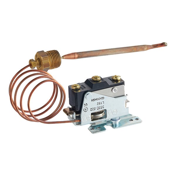 A copper tube with a metal device and two copper wires attached to a Hatco thermostat.