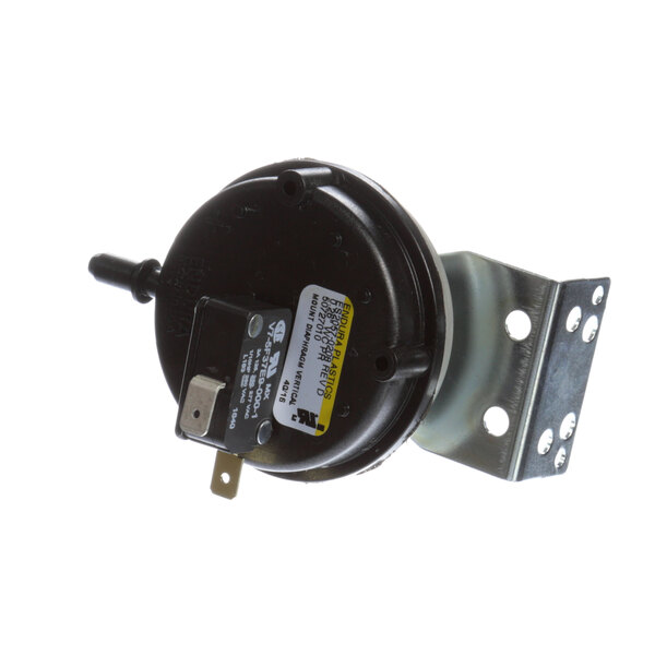 A Revent burner air switch with a metal bracket.